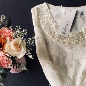 White ivory dress pearls and lace